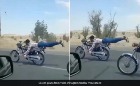 Dangerous Stunts : बाइक पर लेट कर शख्स कर रहा था स्टंट, पलक झपकते ही सामने आ गई कार, फिर जो हुआ वीडियो देख हिल जाएंगे आप